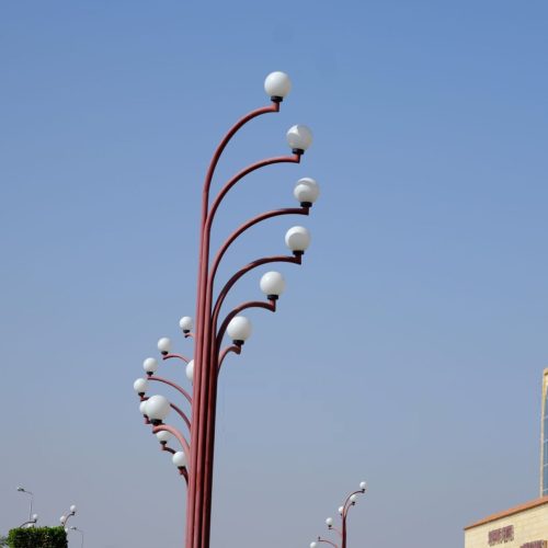 Vintage street lamp over blue sky. Selective focus
